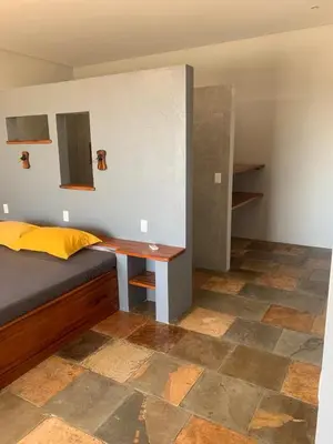 Uma cama ou camas num quarto em Vila Kite Lagoon