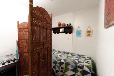 Uma cama ou camas num quarto em Charmoso Flat Funcional No PAPICU Próximo AO SHOPPING RIO MAR