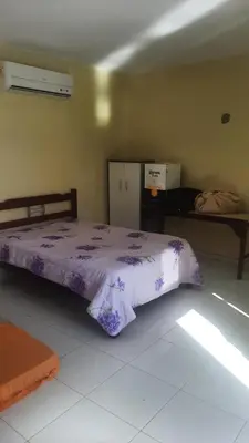 Uma cama ou camas num quarto em Rooftop na lagoa