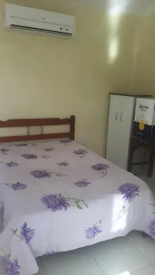 Uma cama ou camas num quarto em Rooftop na lagoa