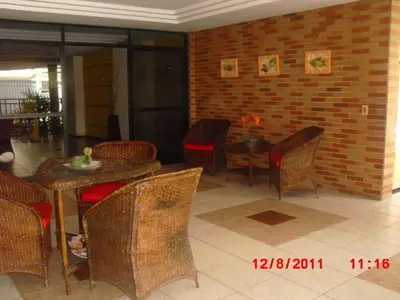 Uma área de estar em Apartamento em Meireles