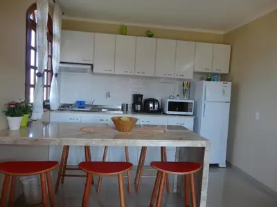 A cozinha ou kitchenette de Chale Canoa Quebrada La Fazenda