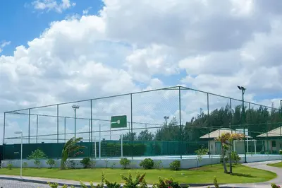 Comodidades para jogar ténis e squash em VG Sun #209 - Apartamento no Cumbuco por Carpediem ou nas proximidades