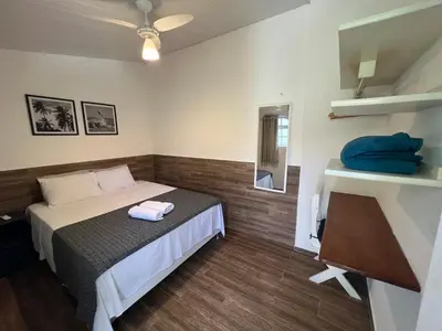 Uma cama ou camas num quarto em Bada Hostel & Kite School