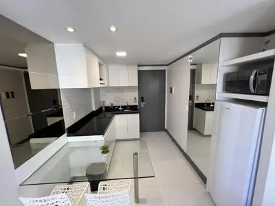 A cozinha ou kitchenette de Particular Blue Tree Towers Beira Mar