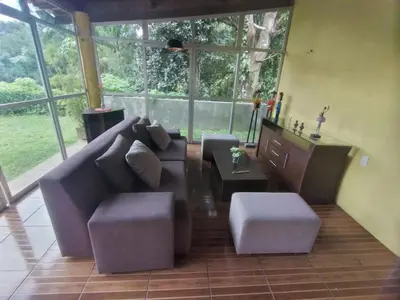 Uma área de estar em Linda casa em Guaramiranga