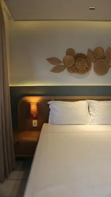Uma cama ou camas num quarto em Movimento Suites