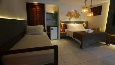 Uma cama ou camas num quarto em Movimento Suites