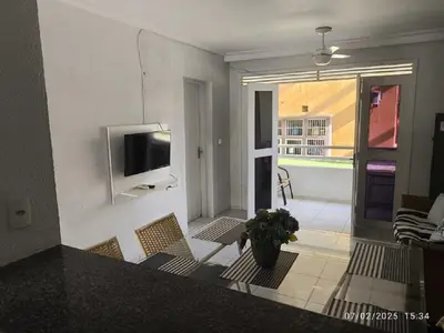 Uma televisão e/ou sistema de entretenimento em Apartamento 2 quartos a 230mts da Praia do Futuro com lazer completo 19