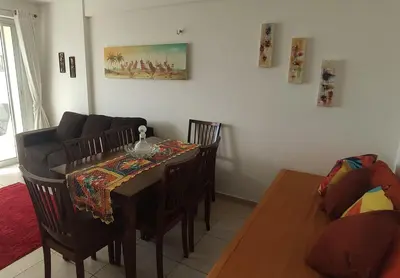 Uma área de estar em Beach Village 707 Norte frente ao mar