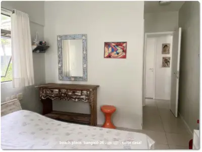 Uma cama ou camas num quarto em Beach Place Resort . ap térreo