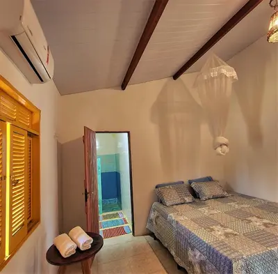 Uma cama ou camas num quarto em Sítio SPA Céu De Verdade , Praia de Barra Nova , Ceará