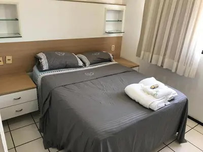 Uma cama ou camas num quarto em Apartamento Meireles
