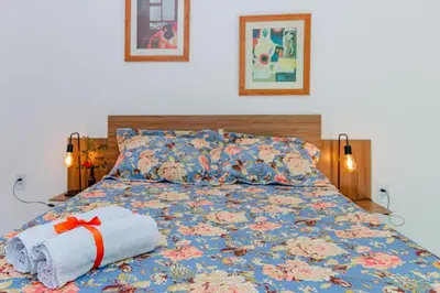 Uma cama ou camas num quarto em Éden do Catu
