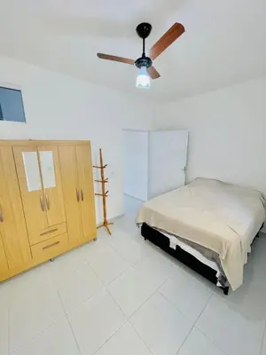 Uma cama ou camas num quarto em Casa do Bruno - Apartamento terreo - 1 - Terra - Quarto e sala com cozinha americana na praia do preá-CE