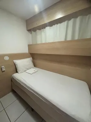 Uma cama ou camas num quarto em Beach Class Fortaleza by AM