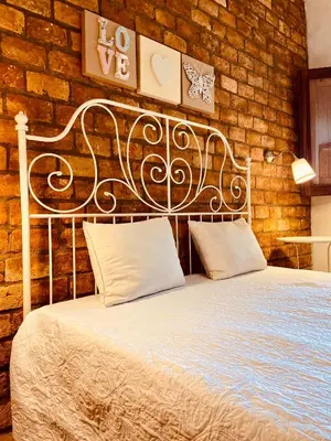 Uma cama ou camas num quarto em Casa Dos Patos