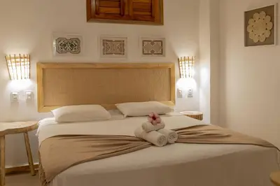Uma cama ou camas num quarto em Pousada Chez Ellery Jeri