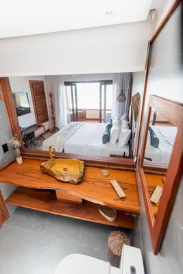 Uma cama ou camas num quarto em Carlore Hotel Taíba