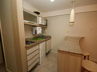 A cozinha ou kitchenette de Flat Hotel Mercure Vista Mar