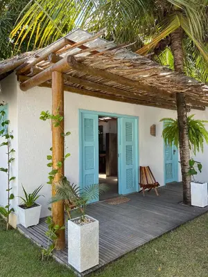 Um jardim no exterior de Villa Parazinho
