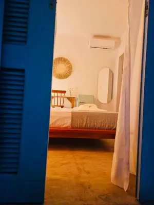 Uma cama ou camas num quarto em Villa Parazinho
