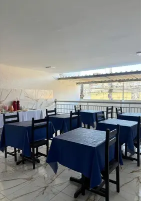 Um restaurante ou outro lugar para comer em Hotel Sol Brasil