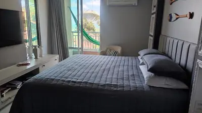 Uma cama ou camas num quarto em Apto Vista Mar alto padrão Paraíso das Dunas