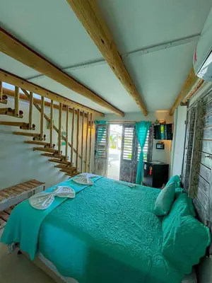 Uma cama ou camas num quarto em ASAS DEL MAR - SUITES