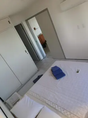 Uma cama ou camas num quarto em Apto privado no Edifício residencial Náutico 5 ºandar