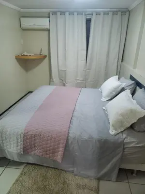 Uma cama ou camas num quarto em Apartamento com toda mobília nova de frente para o mar praia de iracema