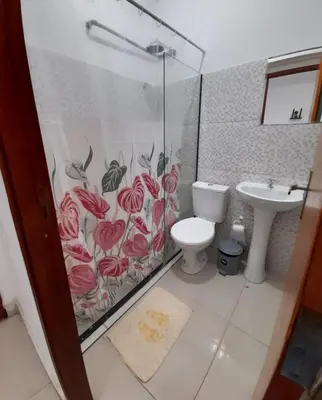 Uma casa de banho em Central Palace Hotel