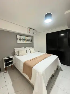 Uma cama ou camas num quarto em 202 Landscape - torre Gold B