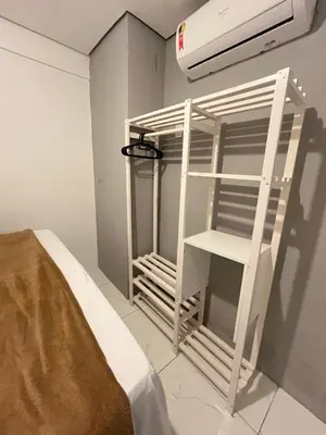 Uma cama ou camas num quarto em 202 Landscape - torre Gold B
