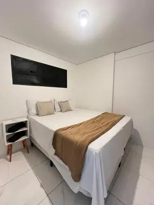 Uma cama ou camas num quarto em 202 Landscape - torre Gold B