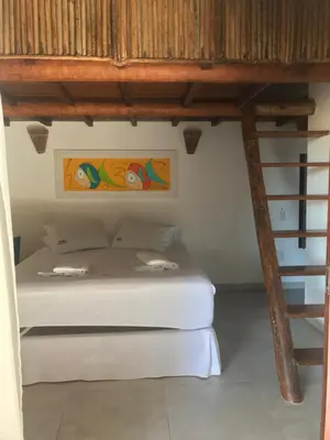 Uma cama ou camas num quarto em Beijo Mar Beach Club