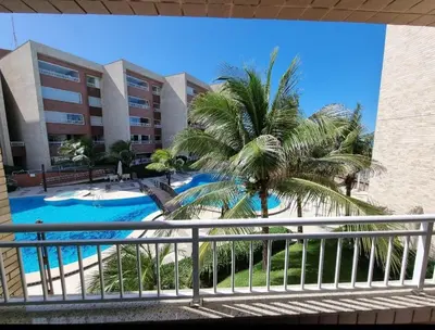 A piscina em ou perto de Apt pé na areia ao lado do Beach Park no Porto das Dunas