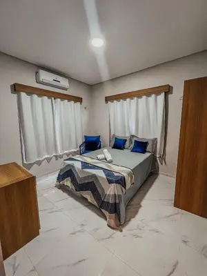 Uma cama ou camas num quarto em Chill House Praia do Preá-CE
