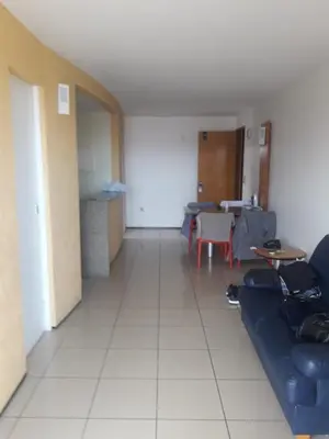 Uma área de estar em ApartHotel - Praia Mansa 1 e 2 Qtos