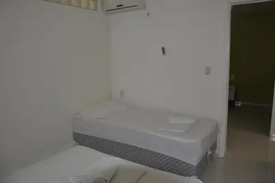 Uma cama ou camas num quarto em Village Cartier