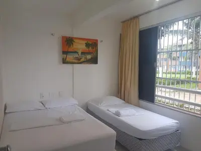Uma cama ou camas num quarto em Village Cartier