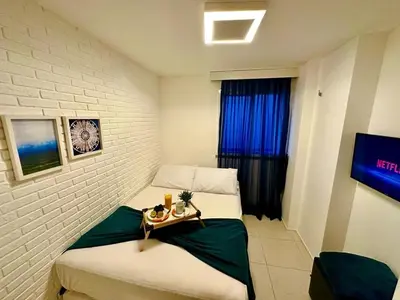 Uma cama ou camas num quarto em Porto Beach Conforto e Lazer a 200m do B Park