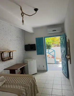 Uma cama ou camas num quarto em Pousada Lua de Jeri