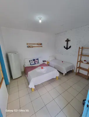 Uma cama ou camas num quarto em Pousada Lua de Jeri