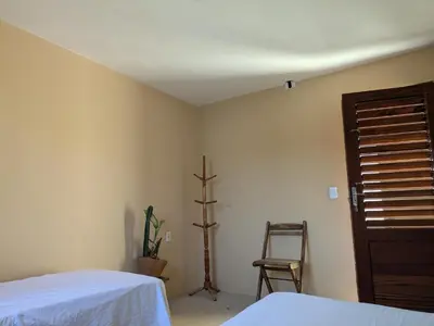 Uma cama ou camas num quarto em SOS Kite Hostel