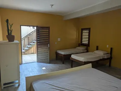 Uma cama ou camas num quarto em SOS Kite Hostel