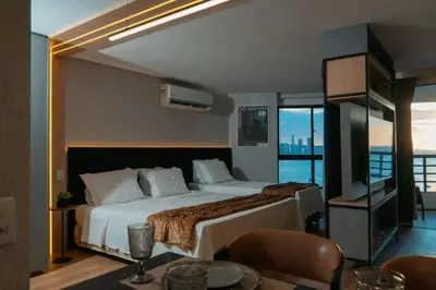 Uma cama ou camas num quarto em Beira Mar Fortaleza – Flat de Luxo no Iate Plaza!
