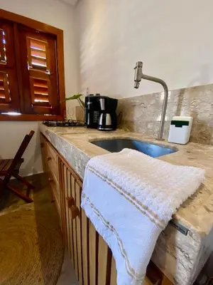 A cozinha ou kitchenette de Casa Pitanga Flat