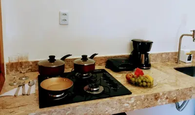 A cozinha ou kitchenette de Casa Pitanga Flat