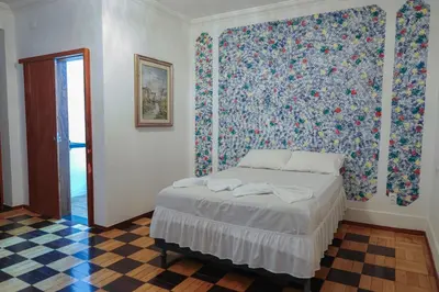 Uma cama ou camas num quarto em Hotel pousada Krone Praia de Iracema Fortaleza